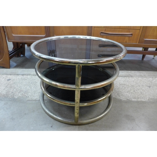 70 - An Italian tubular metal and smoked glass coffee table, manner of Milo Baughman