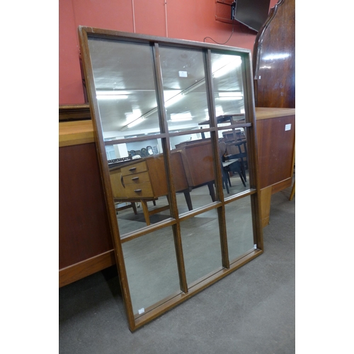 86 - A teak framed mirror