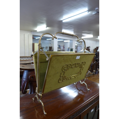 98 - An Italian brass folding newspaper rack