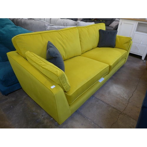 1323 - A Barker and Stonehouse mustard velvet four seater sofa RRP £1589