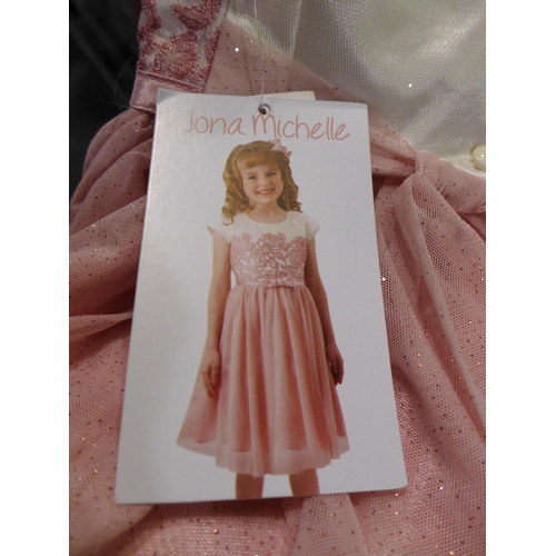 3050 - 4 Girl's Jona Michelle pink and cream party dresses size 5 * this lot is subject to VAT