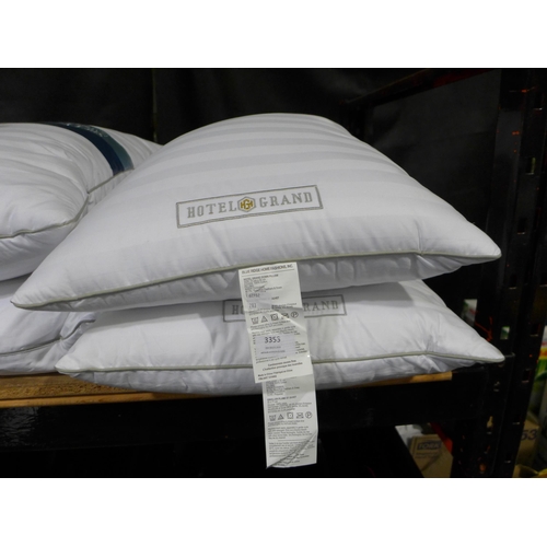 3353 - Two Hotel Grand Down Roll  Jumbo Pillows (283-443) * This lot is subject to VAT