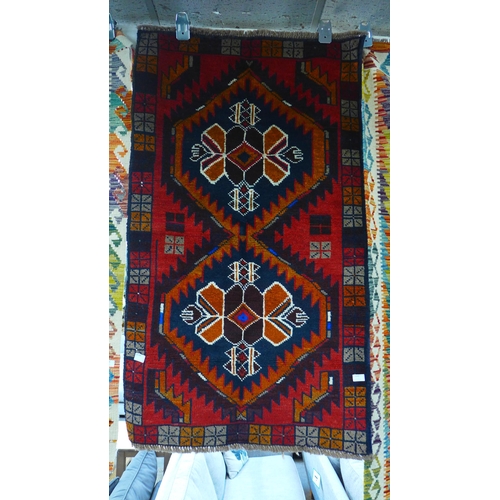 1474 - A New Baluchi runner, 144cm x 83cm