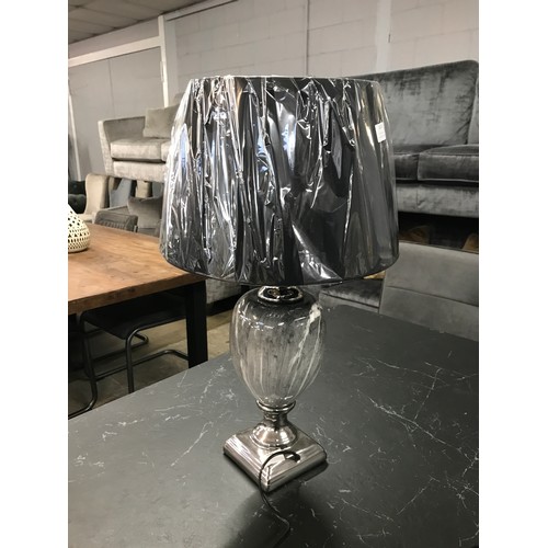 1424 - A black marble effect urn table lamp with black shade H62cm