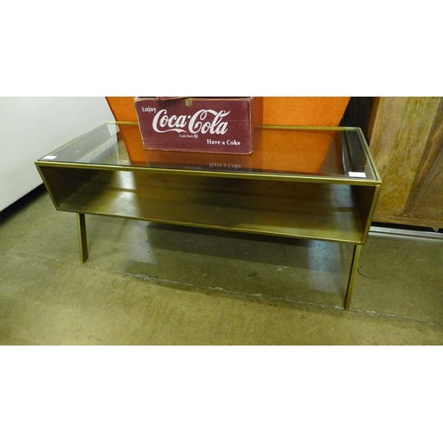 1335 - A gold metal and glass industrial style coffee table/TV stand