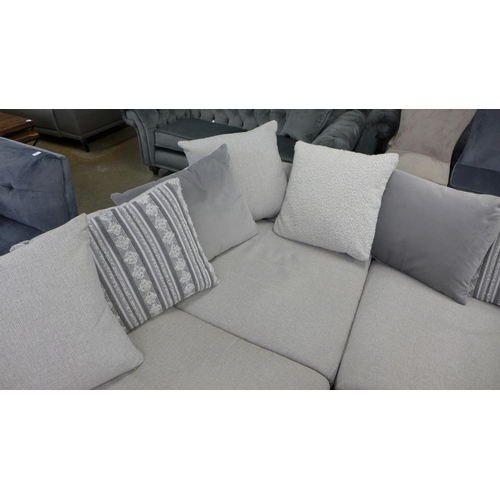 1453 - A stone grey textured weave upholstered LHF corner sofa with patterned scatter cushions