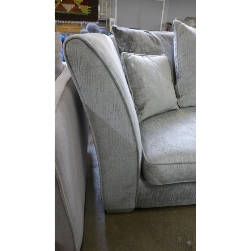 1470 - An Aria silver upholstered four seater sofa and love seat