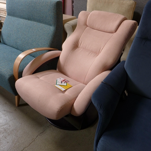 1564 - A Maxim Moda pink upholstered swivel pushback reclining armchair RRP £1099