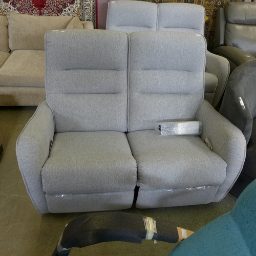 1570 - A Vigo Modulo silver upholstered electric reclining three seater sofa RRP £899