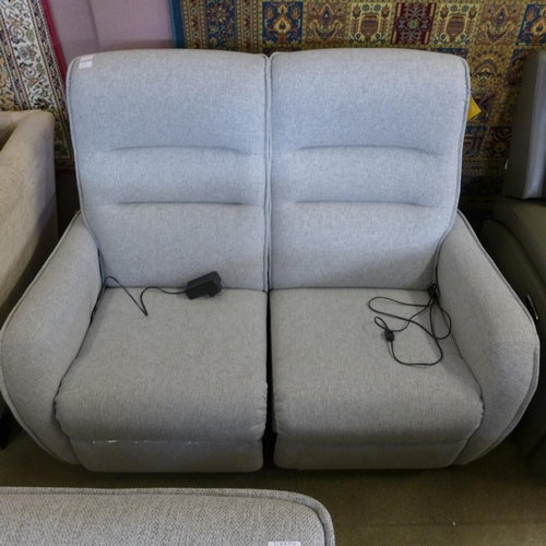 1571 - A Vigo Madulo silver upholstered electric reclining two seater sofa RRP £899