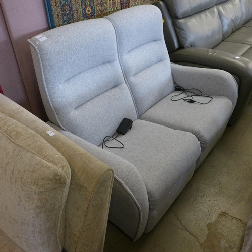 1571 - A Vigo Madulo silver upholstered electric reclining two seater sofa RRP £899