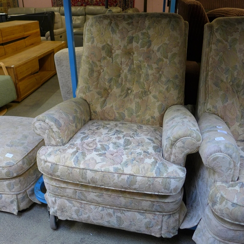 1597 - A floral patterned upholstered two seater sofa and an armchair with footstool