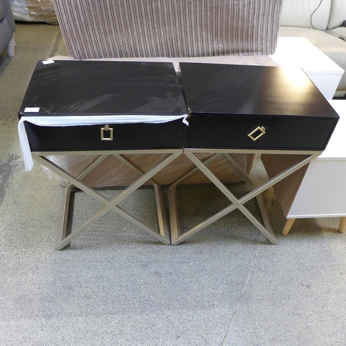 1616 - A pair of black bedside tables with cross legs