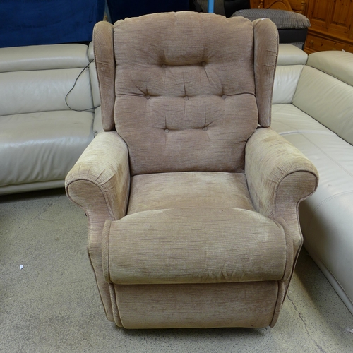 1631 - A chocolate button back upholstered electric reclining armchair - worn