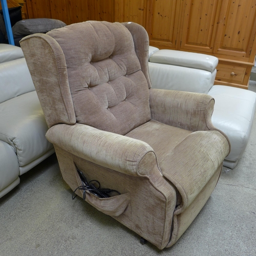 1631 - A chocolate button back upholstered electric reclining armchair - worn