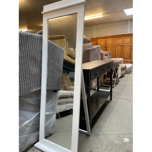 1617 - A black three drawer console table and a cheval mirror, both with some damage