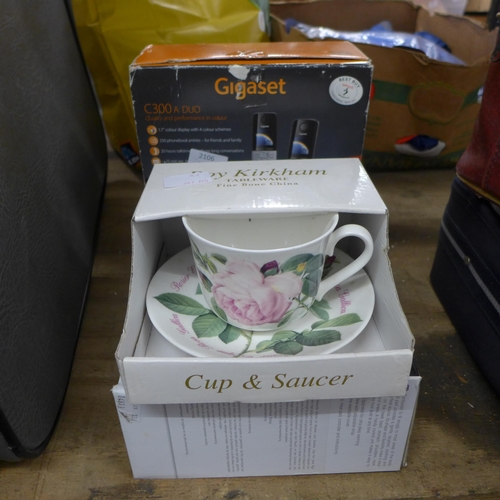 2106 - China Roy Kirkham tea set and boxed Rio heat pad with Gigaset cordless phones