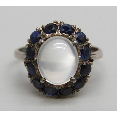 1051 - A silver set, moonstone and sapphire ring, R