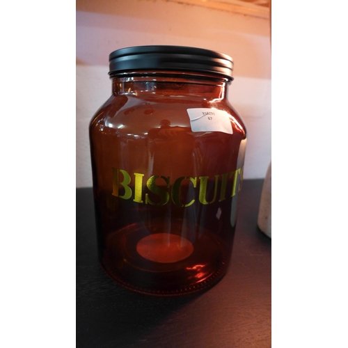 1309 - An amber glass biscuit jar - H 21cms (67825905)