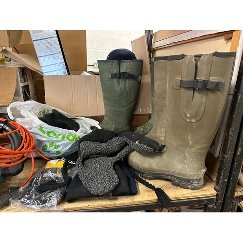 2130 - Two pairs of Wellingtons size 7 and 9 with bag of gloves and hats