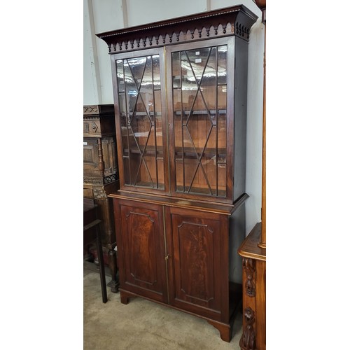 128 - A George IV style mahogany bookcase