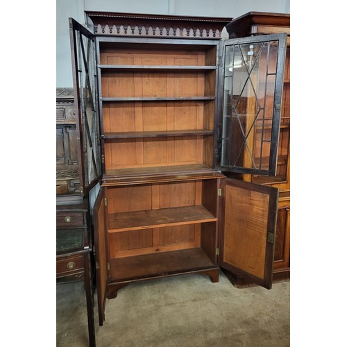 128 - A George IV style mahogany bookcase