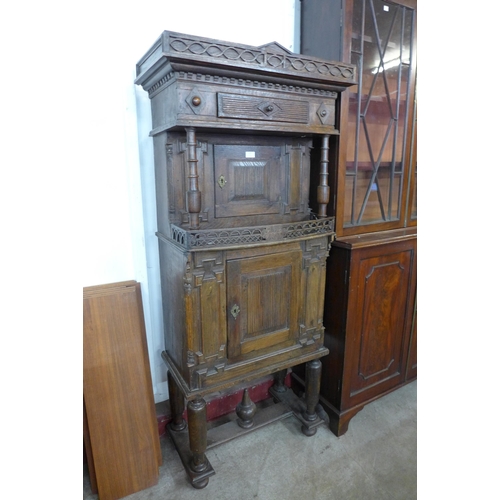 129 - A 19th Century Flemish carved oak credence cupboard