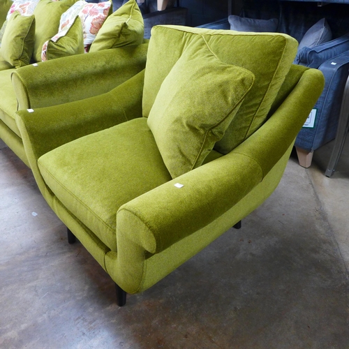 1328 - A metallic sheen green upholstered armchair