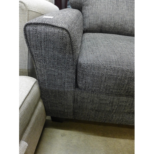 1342 - A charcoal upholstered three seater sofa