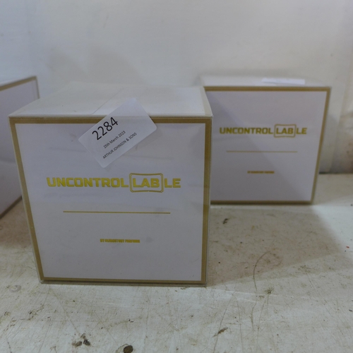 2263 - 2 100ml bottles of UncontrolLABle scent/ perfume boxed and unused