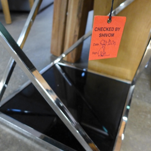 1356 - A chrome and black glass lamp table