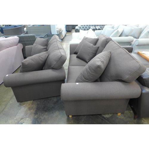 1385 - A pair of Mosta Aosta chocolate upholstered sofas (3 + 2) - This lot is subject to VAT*