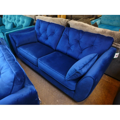 1389 - A deep ocean blue velvet three seater sofa