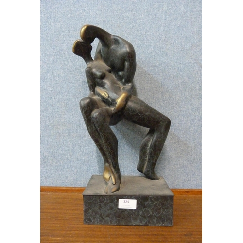 318 - A bronze abstract figure of two lovers