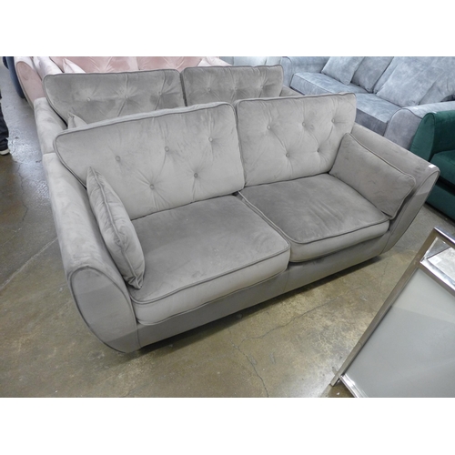 1415 - A Hoxton mink velvet upholstered three seater sofa and footstool