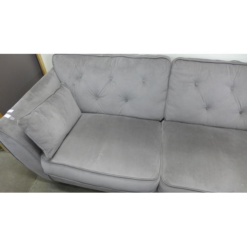 1415 - A Hoxton mink velvet upholstered three seater sofa and footstool