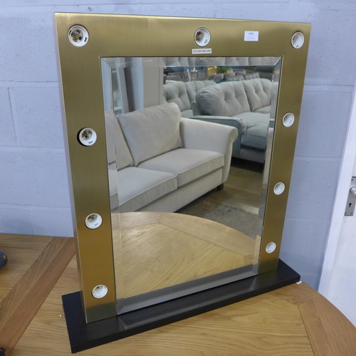 1428 - A gold framed Hollywood mirror