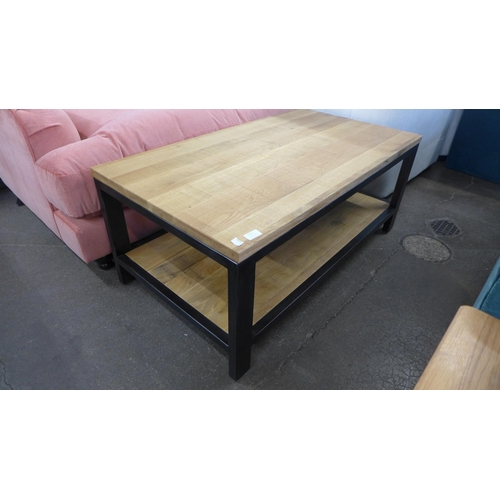 1431 - A black metal and oak rectangular coffee table * this lot is subject to VAT
