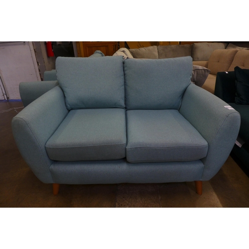 1517 - A baby blue upholstered two seater sofa with a pair of armchairs - slight marks