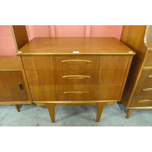 13 - A Jentique teak metamorphic desk /chest of drawers