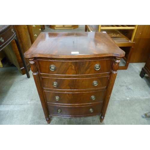 139 - A small mahogany serpentine chest of drawers
