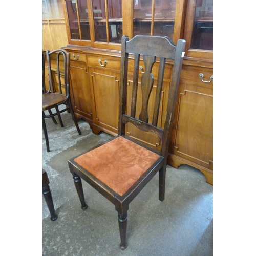 169 - A set of six Arts and Crafts oak dining chairs
