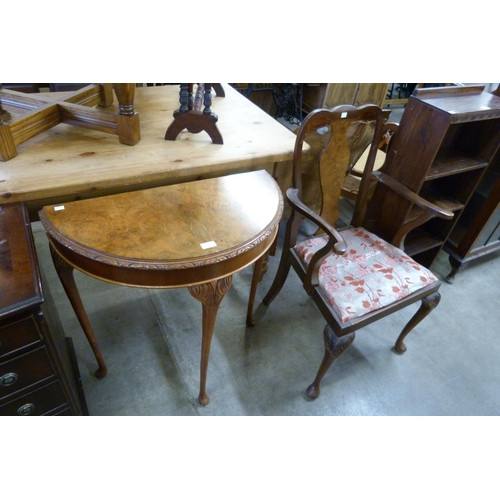 173 - A burr walnut demi-lune hall table and a chair