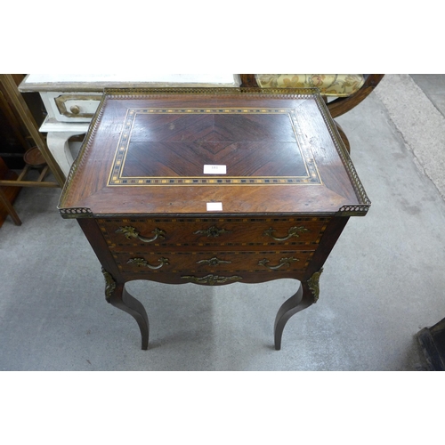 181 - A French Louis XV style inlaid rosewood and gilt metal mounted two drawer gueridon table