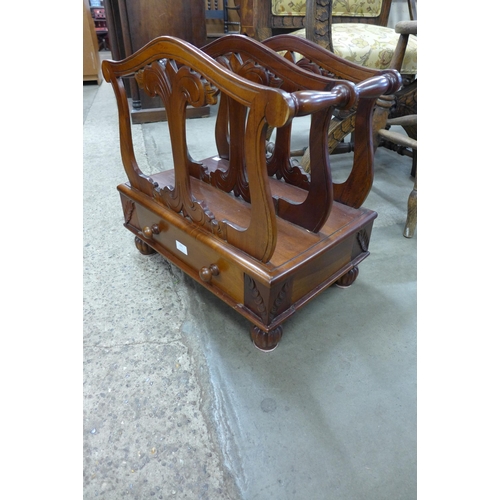 221 - A Regency style carved hardwood Canterbury