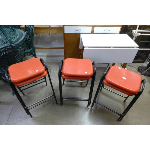 237 - A set of four black metal framed stools