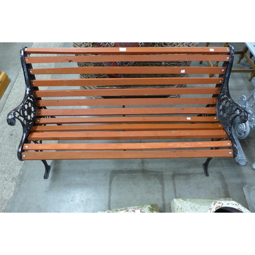 249 - A wrought iron ended garden bench