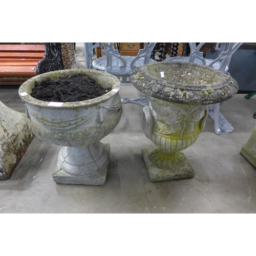 251 - Two concrete garden urns