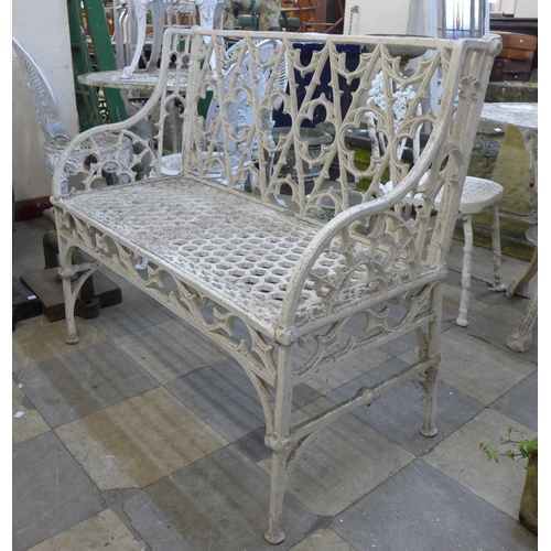 265 - A Victorian style painted cast alloy garden bench