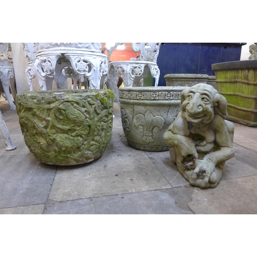 278 - A concrete garden figure of a gargoyle figure and two planters